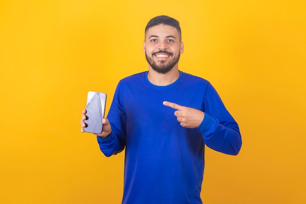 Handsome man with cellphone in hands