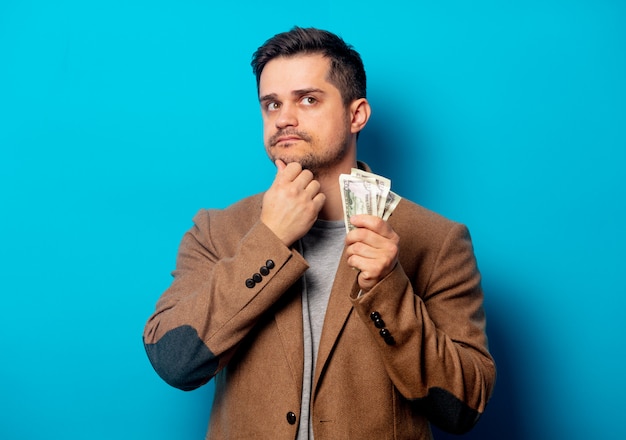 Handsome man with dollars