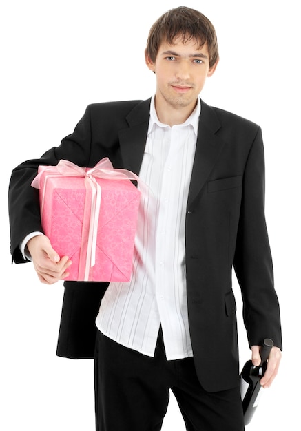 handsome man with pink wrapped gift and bottle of wine