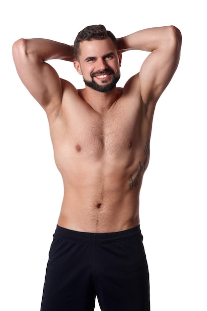 Handsome muscular man on isolated background shows his body sportsmans body sport concept