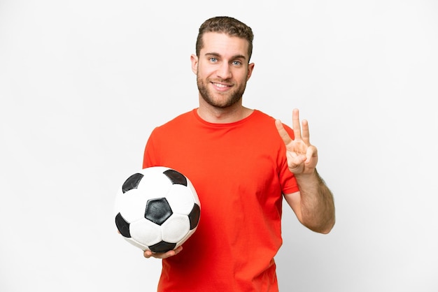 Handsome young football player man over isolated white background happy and counting three with fingers