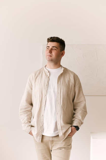 Handsome young man on a light background