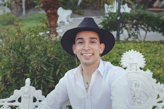 Handsome young man wearing hat Street portrait of young man