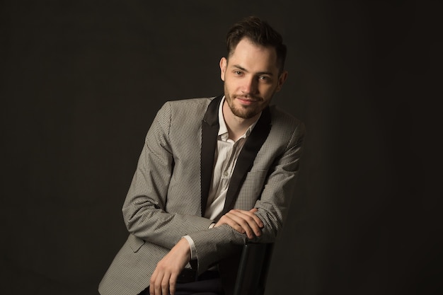 handsome young stylish man in a jacket