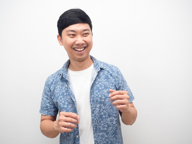 Handsomeman blue shirt cheerful smile gesture happy dancing portrait