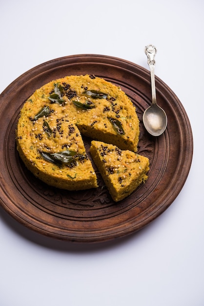 Handvo or handwa is a vegetable cake originating from the Gujarat, India. selective focus