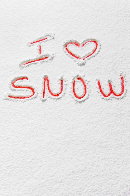 Handwritten text I love snow   winter items seasonal concep