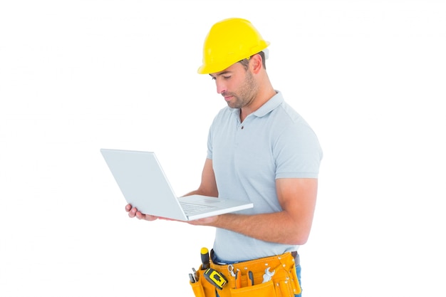 Handyman using laptop