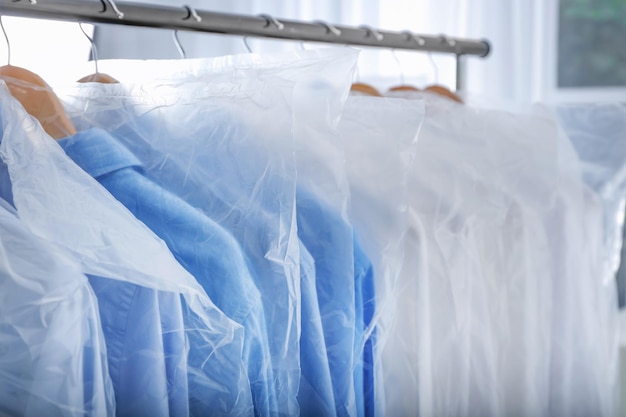 Hangers with clean shirts in laundry closeup