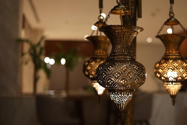 Hanging golden lantern, lamp with arabic decoration for muslim ramadan background