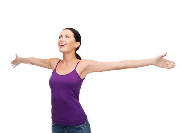 happiness and people concept - smiling girl in blank purple tank top waving hands