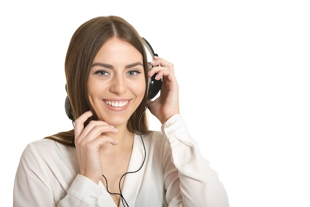 Happy beautiful girl listening  music in headphones.