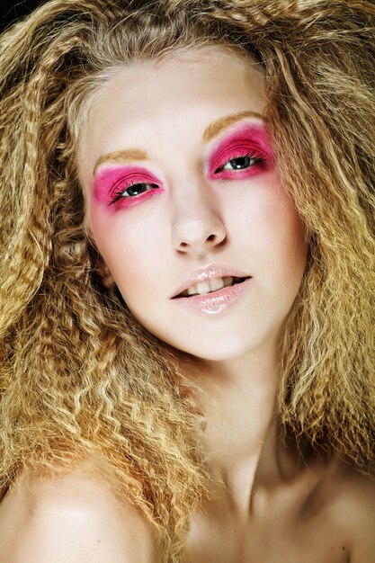 Happy blond with pink make up