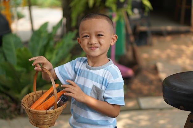 Happy boy in the park in summer