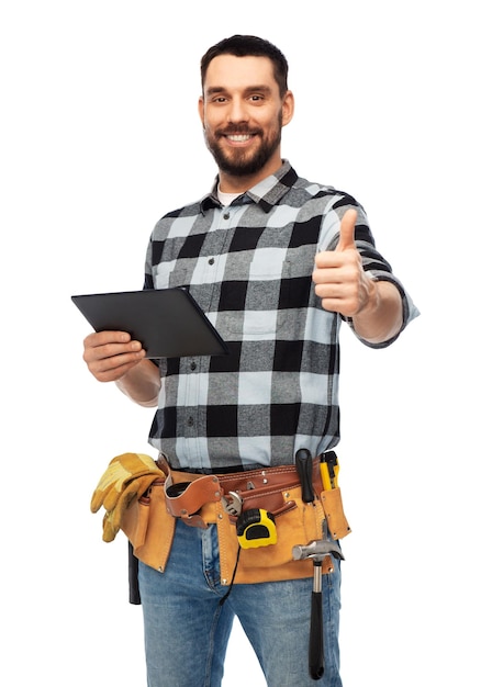 happy builder with tablet computer and tools