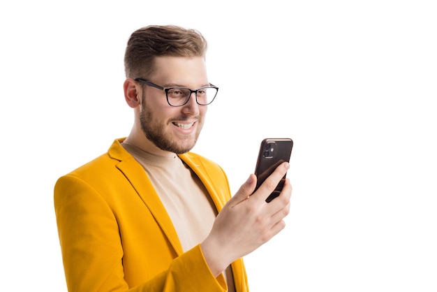 Happy businessman using smartphone