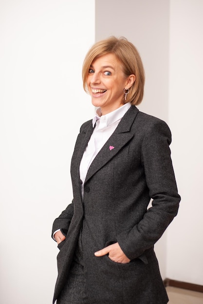 Happy businesswoman on white background