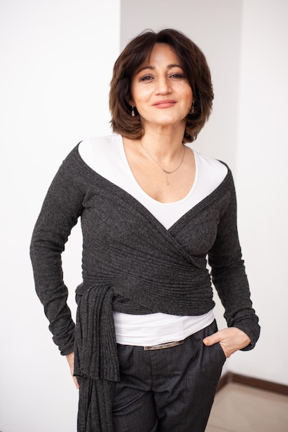 Happy businesswoman on white background