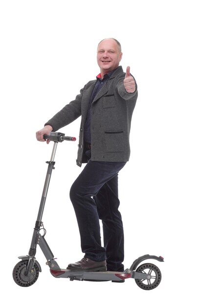 Happy casual man with electric scooter isolated on a white background