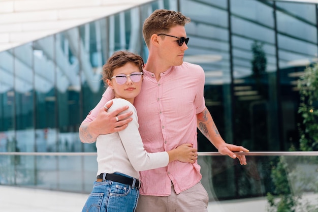 Happy cheerful couple in sunglasses