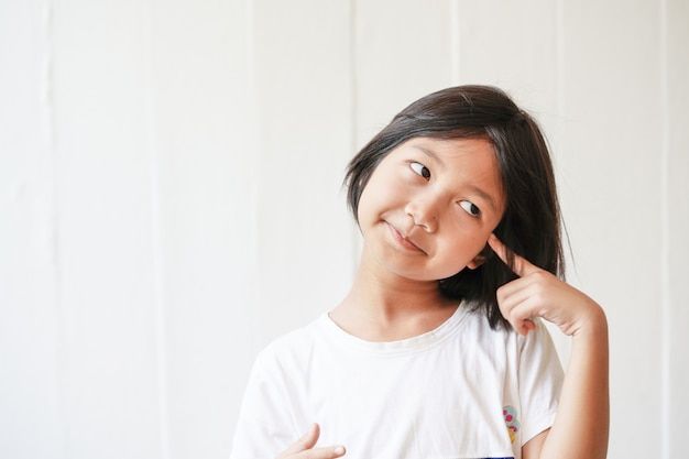 Happy cheerful little girl  with soft light display in fresh morning time