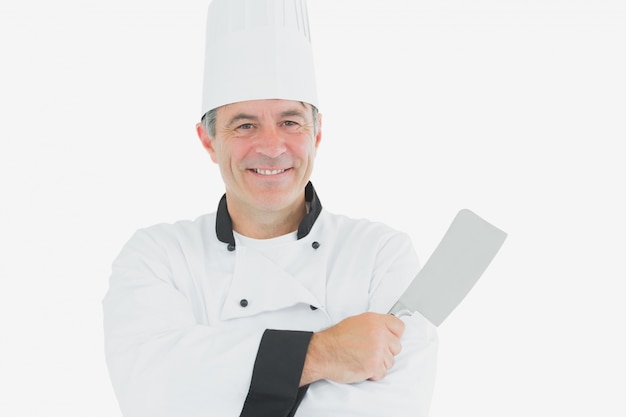 Happy chef holding kitchen knife