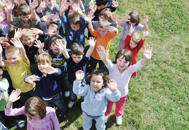 happy child kids group have fun and play at kindergarden indoor preschool education concept with  teacher