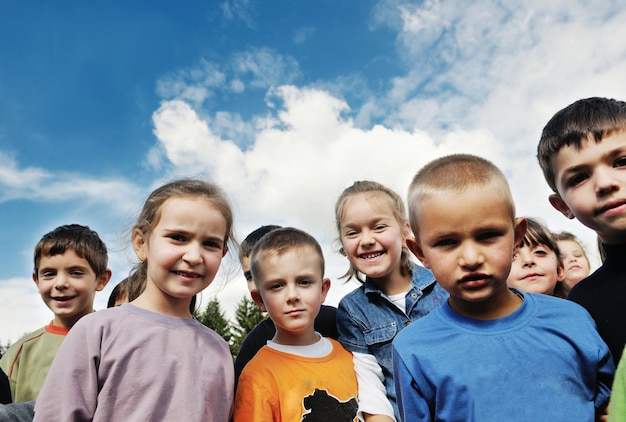 happy child kids group have fun and play at kindergarden preschool education concept with  teacher