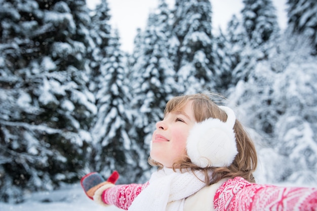 Happy child playing outdoors