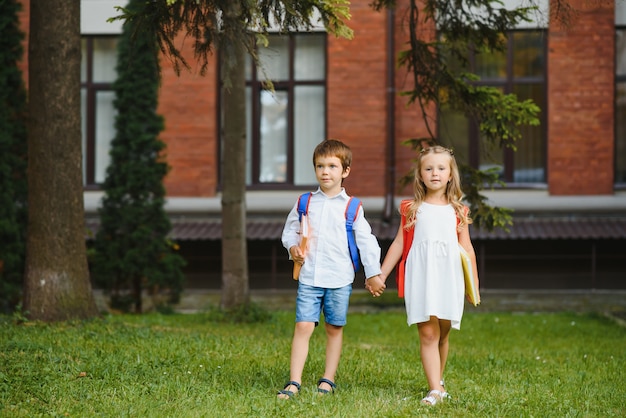 Happy children going back to school