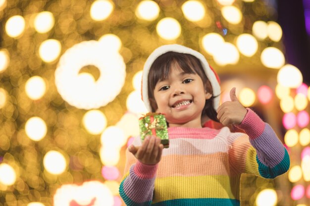 Happy children with Christmas gift