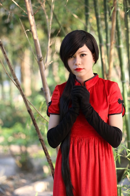 Happy Chinese new year. beautiful young Asian woman dress traditional cheongsam