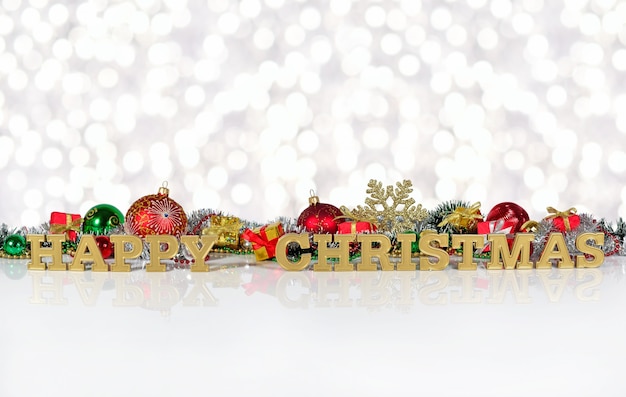 Happy christmas golden text on the background of Christmas decorations on a bokeh background