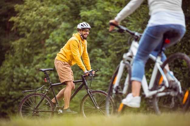 Happy couple on a bike ride