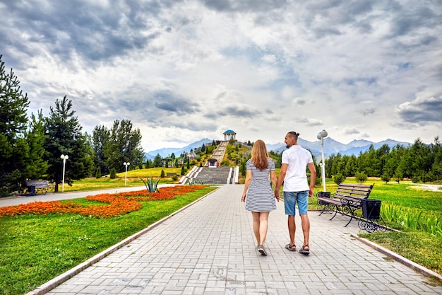 Happy couple dating in the park