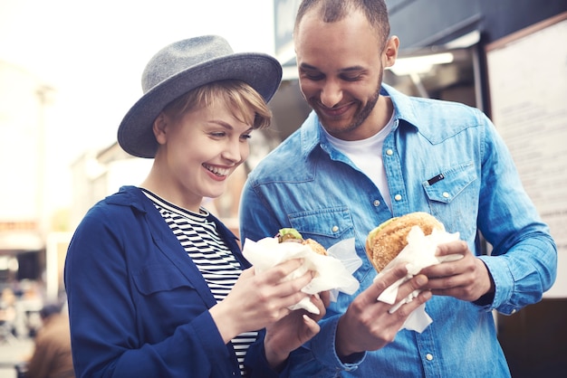 Happy couple enjoying their meal