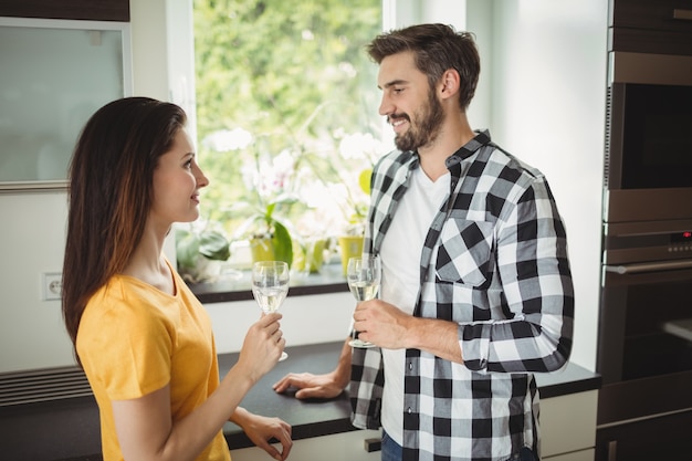 Happy couple holding glasses of champagne