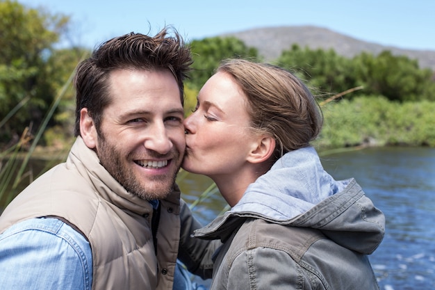 Happy couple at a lake