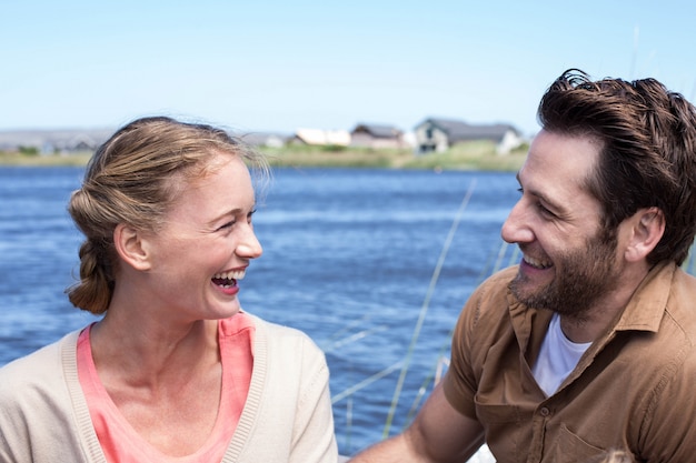 Happy couple at a lake