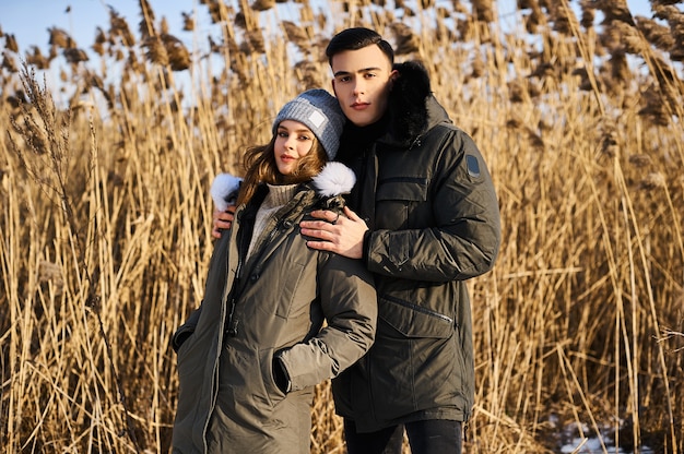 Happy couple outdoors in winter