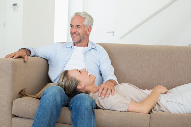 Happy couple relaxing on the couch together