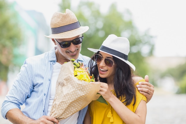 Happy couple with bouquet