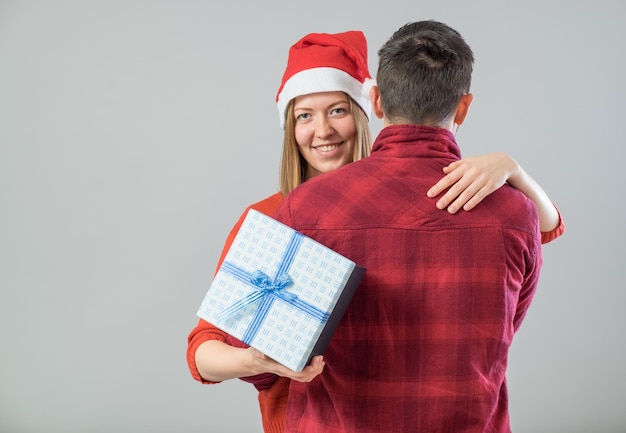 Happy couple with christmas present