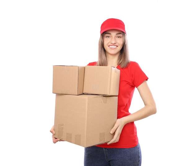 Happy courier with a bunch of boxes