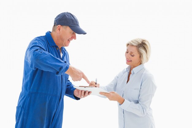 Happy delivery man with customer