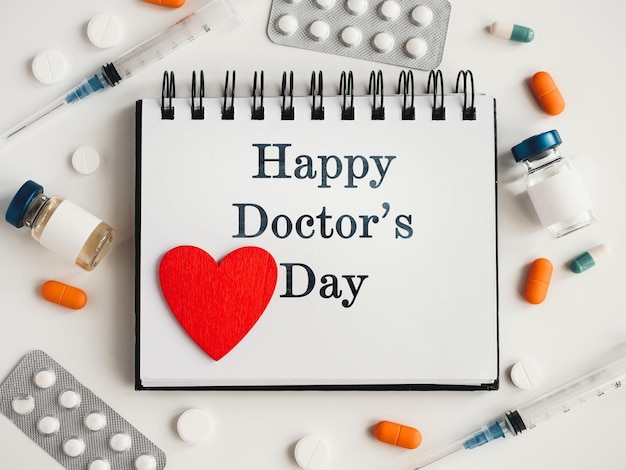 Photo happy doctors day greeting card closeup view from above nobody concept of preparation for a professional holidays congratulations for loved ones relatives friends and colleagues