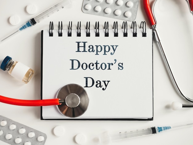 Happy Doctors Day Greeting Card Closeup view from above nobody Concept of preparation for a professional holidays Congratulations for loved ones relatives friends and colleagues