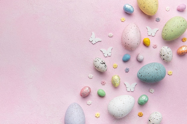 Happy Easter concept Flat lay Easter eggs on pink concrete background