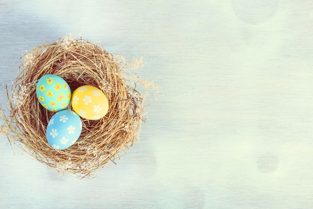 Happy easter Day Easter eggs on wooden background