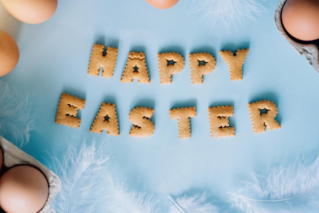 Happy Easter with eggs in colourful blue background